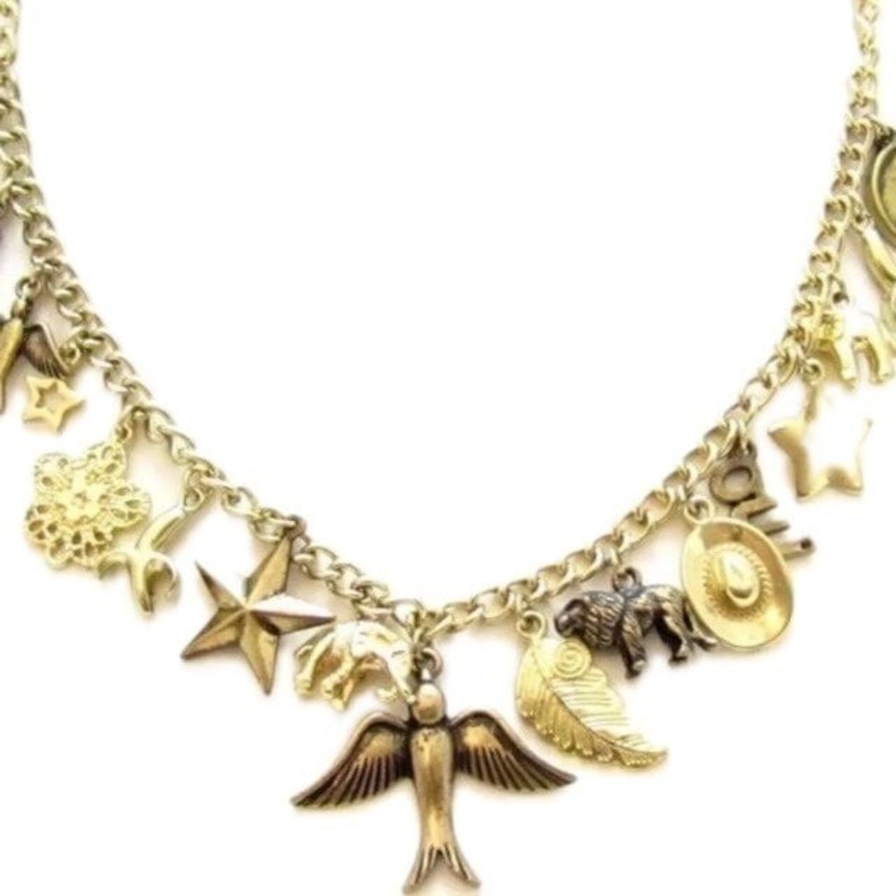 Loaded Gold Toned Animals Bird Elephant Charm Necklace